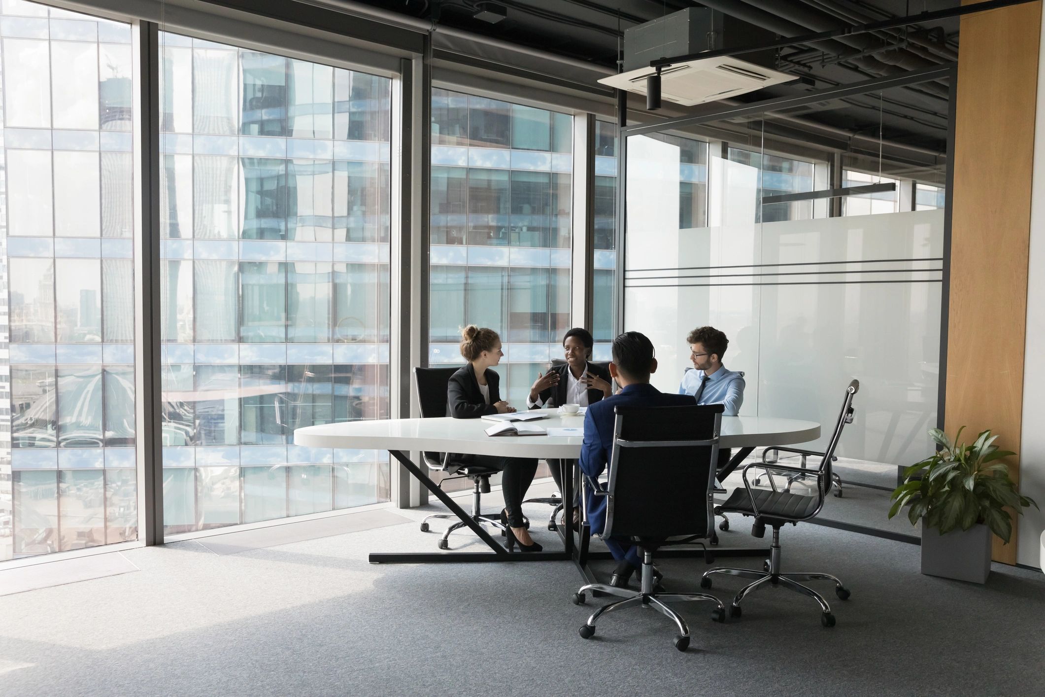 Executive team meeting in a modern office